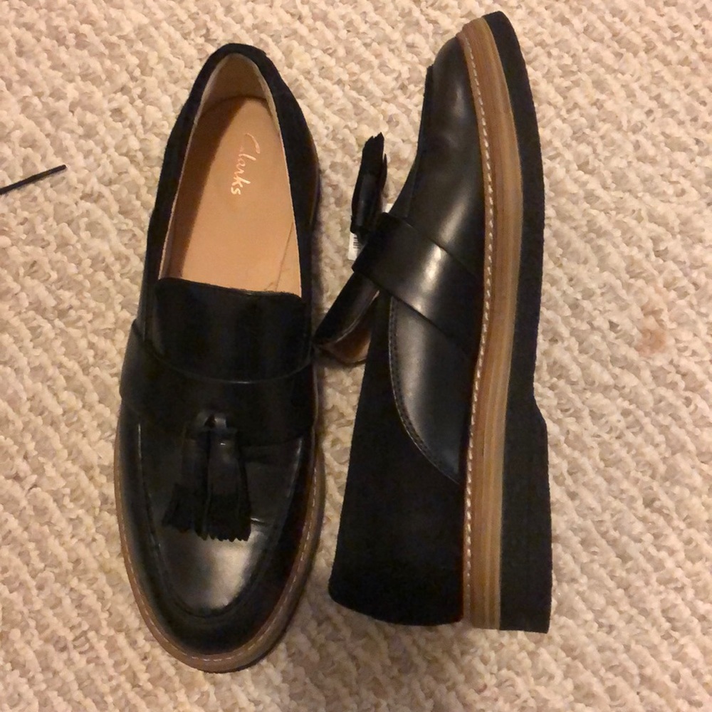 Black Clarks 9.5 slide on leather